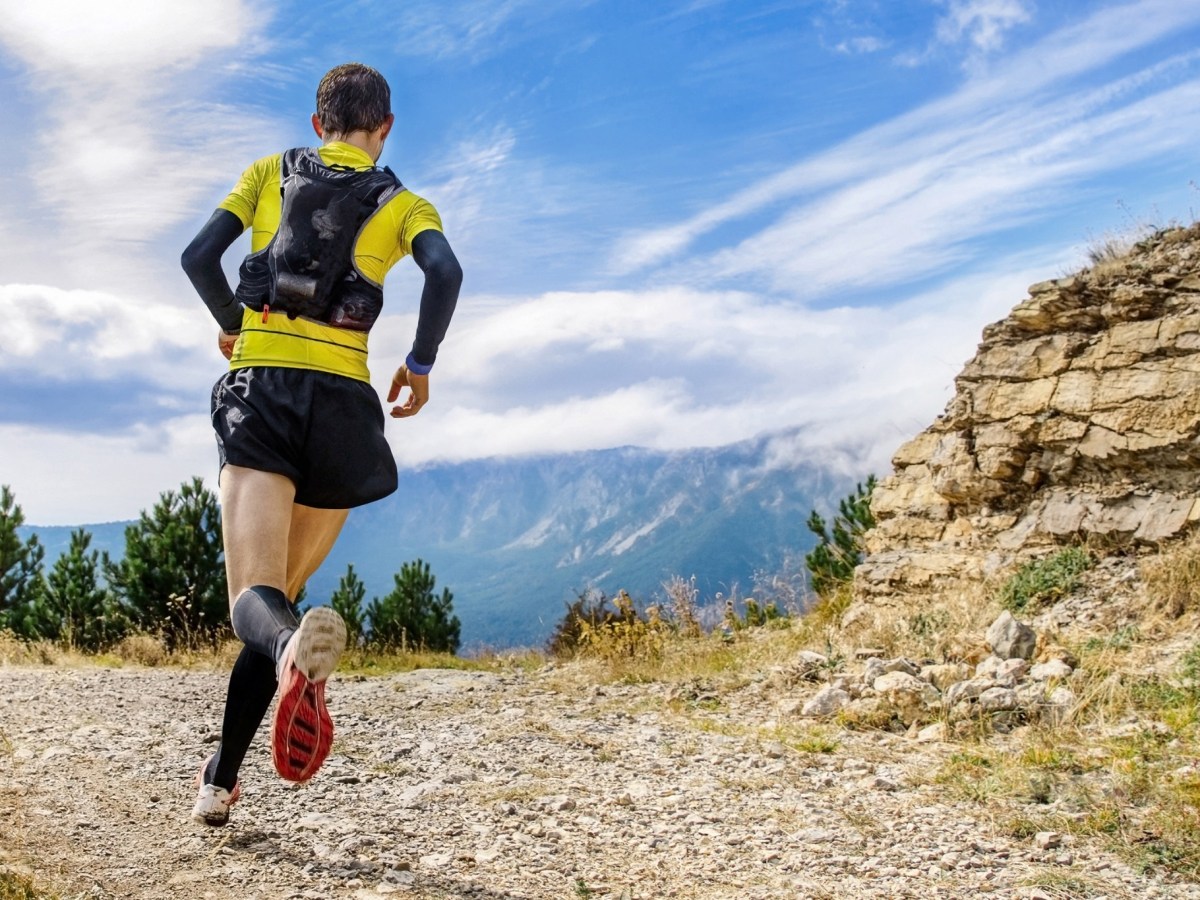 man trail running backpack hydration