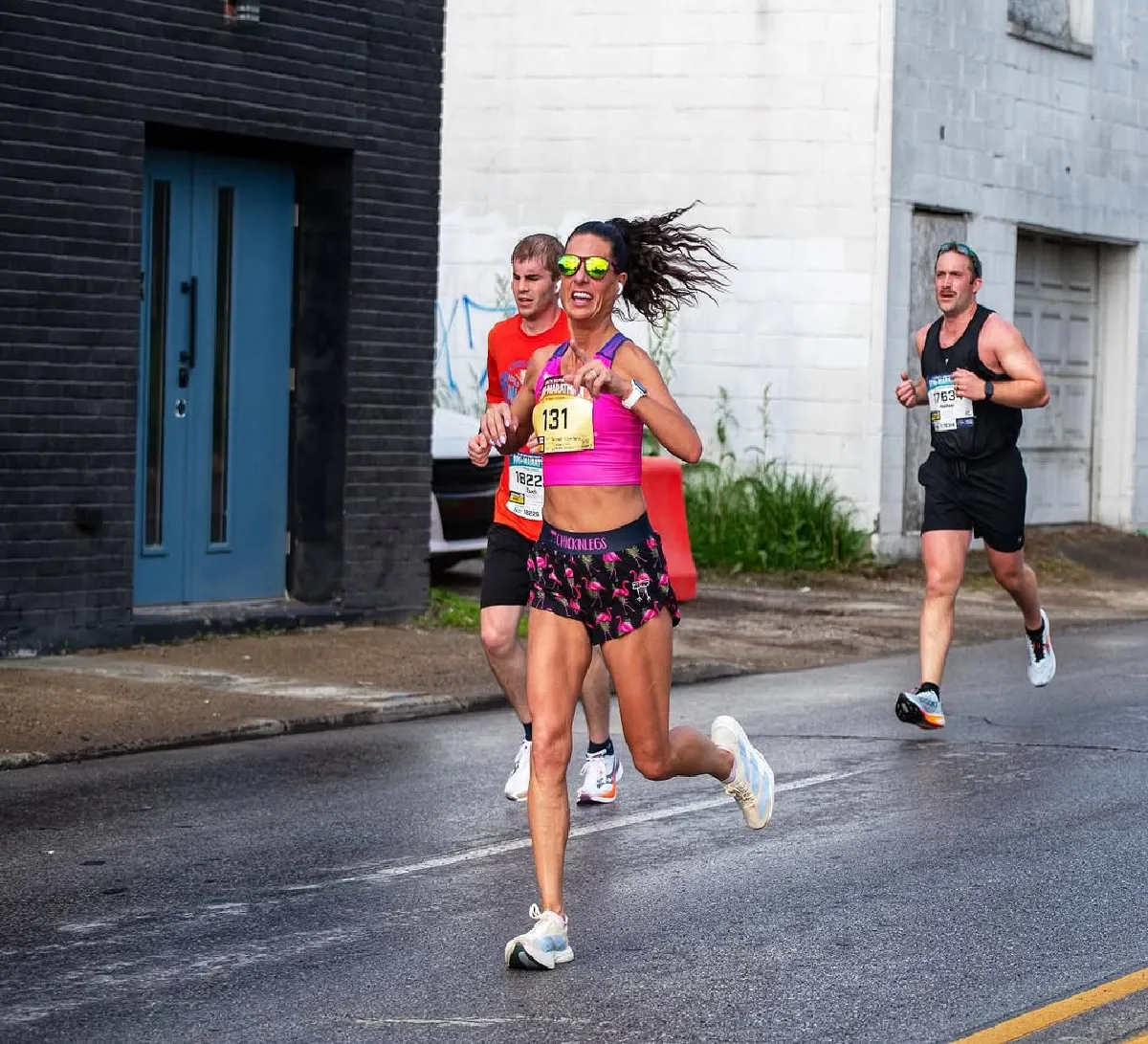 woman running the Indy Mini marathon