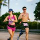 male and female runners at miami marathon